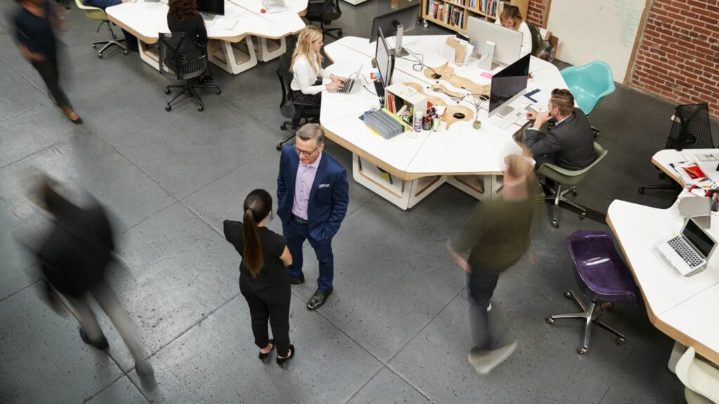 employees in an open-concept office