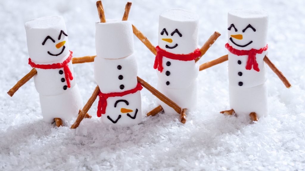 holiday video ideas don't have to be complicated—you could even film clips of simple festive things, like these marshmallow snowmen playing in snow