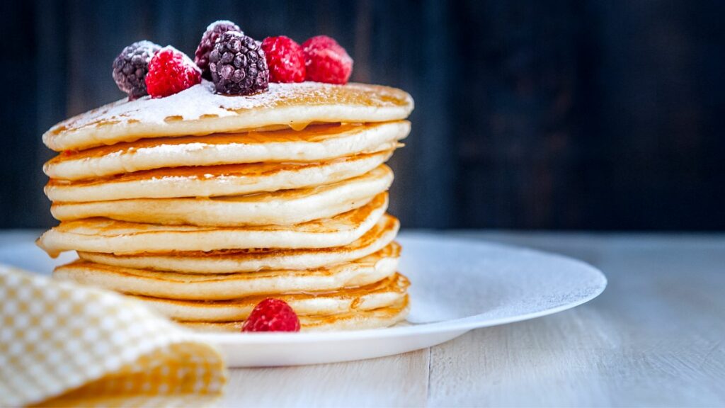 A stack of pancakes serves as a metaphor for the best small business technology stack